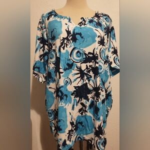 Rebecca Malone woman blue white top